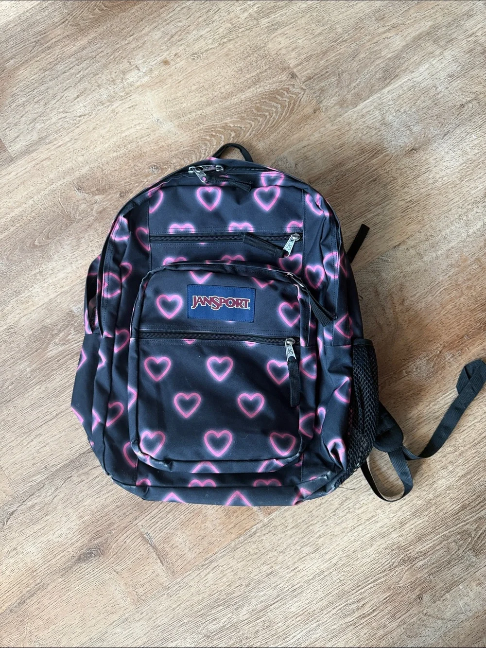 Jansport Black Backpack with Pink Heart Pattern